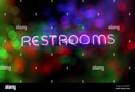 Neon Rainy Window Restroom Sign Stock Photo - Alamy