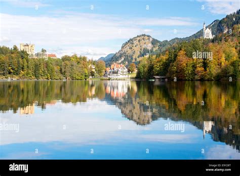 Alpsee lake with the royal castles of Schloss Neuschwanstein and Schloss Hohenschwangau in ...