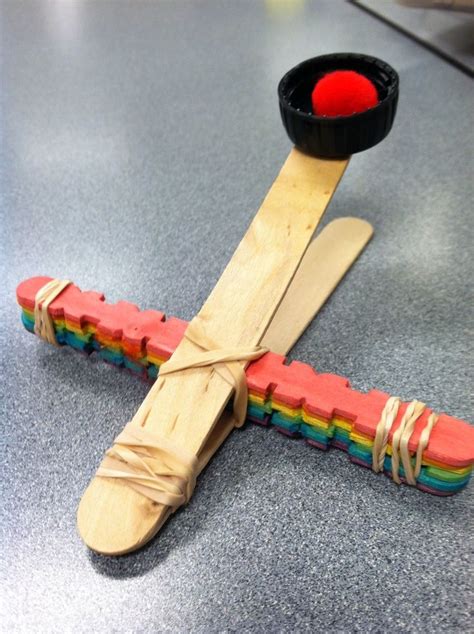 DIY catapult out of Popsicle sticks and rubber bands.. Easy and ...