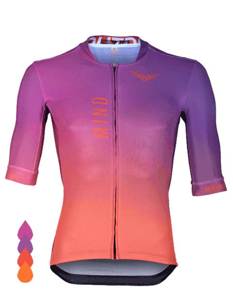 a women's cycling jersey with an orange and pink ombre