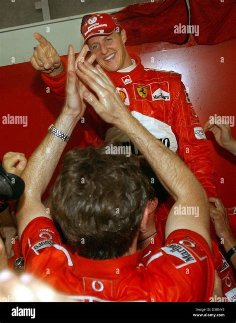 Michael schumacher ferrari team champagne hi-res stock photography and ...