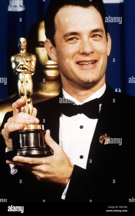 Tom Hanks displays his Best Actor Oscar for PHILADELPHIA, 1994 Stock ...