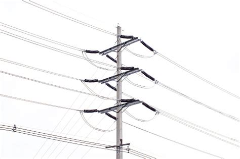 Electricity Pole Against Blue Sky Clouds Stock Photo - Download Image ...