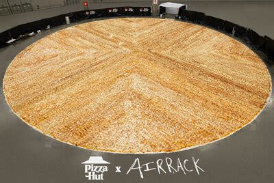 Airrack & Pizza Hut Break GUINNESS WORLD RECORDS™ Title for World's Largest Pizza | YUM Stock News