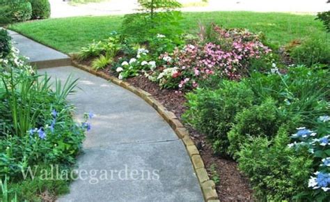 Curbstone edging - keeps mulch off the walkway / driveway good for edging / defining bed lines ...