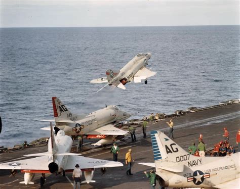 An F-4 Phantom II of Fighter Squadron (VF) 41 launches from the carrier ...