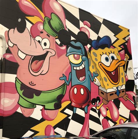 A mural with a SpongeBob/Mickey Mouse cross over on a building | Mickey ...