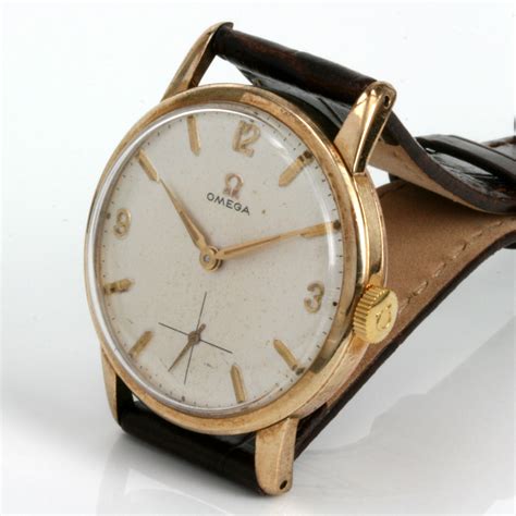 Buy Vintage 1961 Omega watch in gold. Sold Items, Sold Omega Watches ...