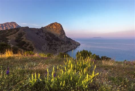 Sunrise in Sea and Mountain Stock Photo - Image of clouds, background ...