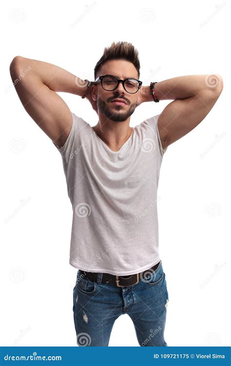 Young Casual Man Posing with Hands Behind Head Stock Image - Image of hipster, handsome: 109721175