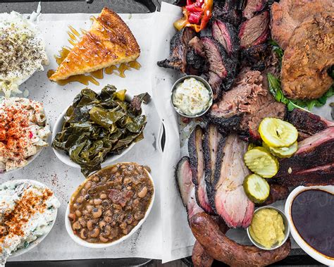 Smoked Barbecue Meat Platter With Southern Sides by Jeremy Pawlowski ...