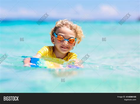 Child Surfing On Image & Photo (Free Trial) | Bigstock