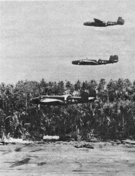 Three North American B-25 Mitchells buzzing Wewak