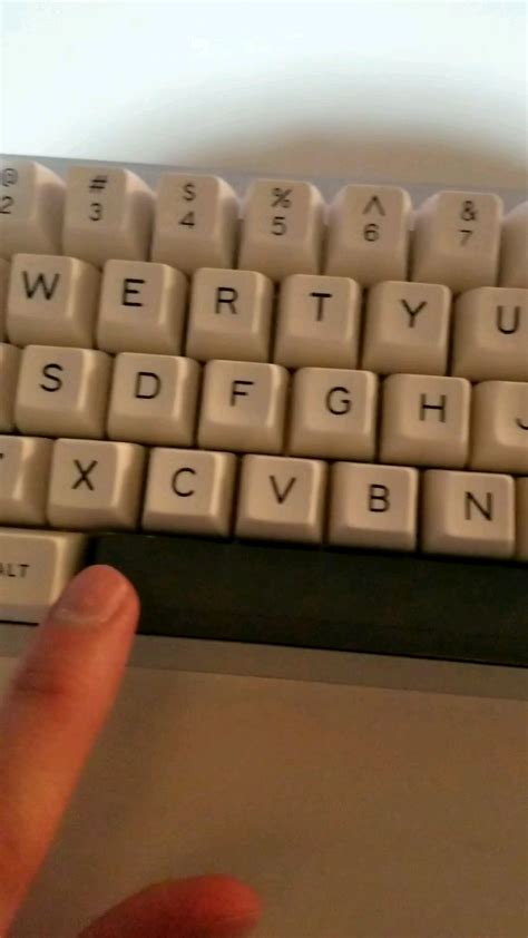 Could someone tell me what this clicking sound is on the right spacebar stabilizer? Details in ...