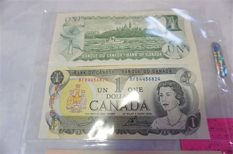 TWO 1973 CANADIAN 1 DOLLAR BILLS SHOWING BOTH SIDES AND 2 1986 2 DOLLAR ...