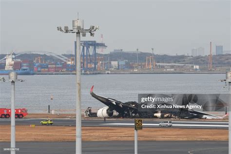 This photo taken on Jan. 3, 2024 shows the wreckage of JAL Flight 516... News Photo - Getty Images