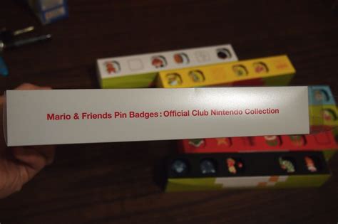 Photos of the Club Nintendo Platinum Pin collection