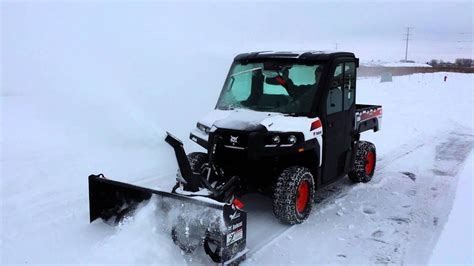 Bobcat 3650 utility vehicle and snowblower - YouTube