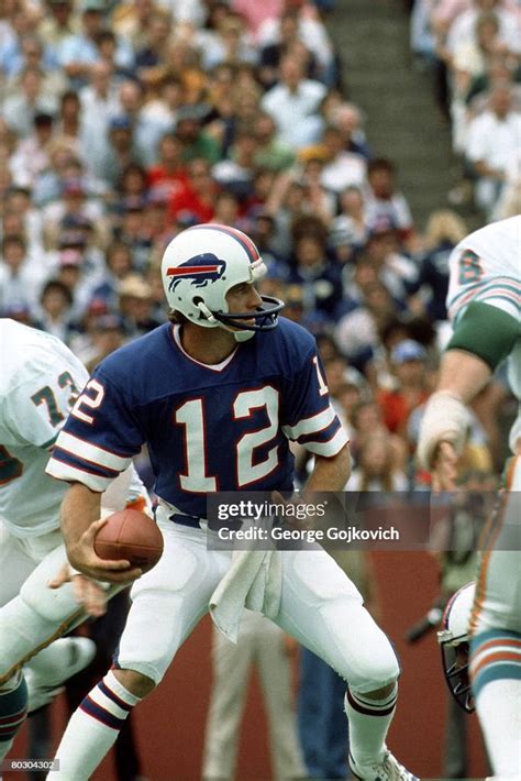 Quarterback Joe Ferguson of the Buffalo Bills scramble during a game ...