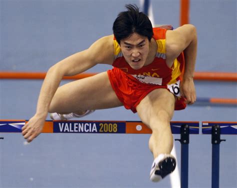 Liu Xiang wins gold in men's 60m hurdles at indoor worlds