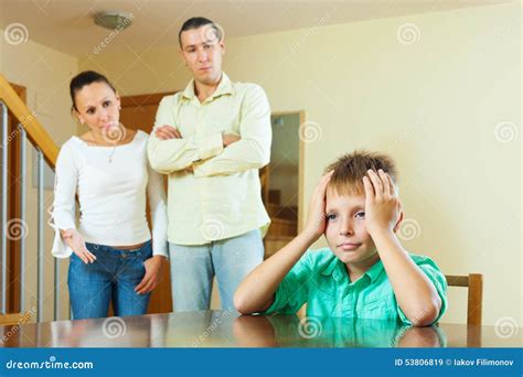 Parents And Teenager Having Conflict At Home Stock Photo - Image: 53806819