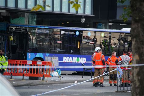 Woman ‘critical’ in hospital as Manchester bus crash driver arrested ...