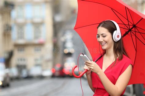 Woman Listening To Music a Rainy Day in the Street Stock Image - Image ...