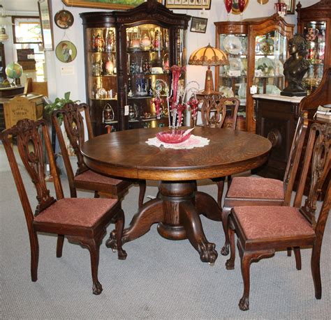 Bargain John's Antiques | Antique Round Oak Dining Table - carved claw feet - 5 leaves ...