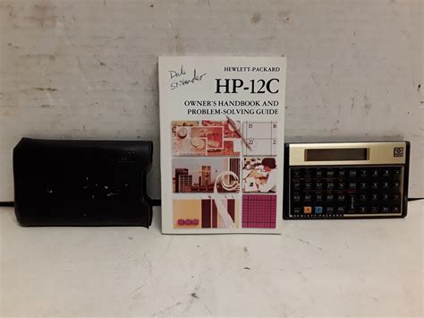 Hewlett Packard HP 12C owner's handbook and calculator - Calculators