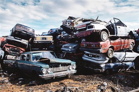 "Junk Yard" by Stocksy Contributor "Raymond Forbes LLC" | Scrap car, Junkyard cars, Abandoned cars