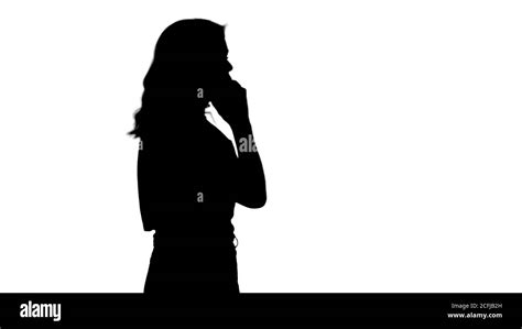 Silhouette Woman talking on the phone Stock Photo - Alamy