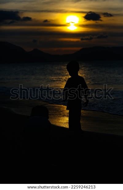 Silhouette Two Children Playing On Beach Stock Photo 2259246213 ...