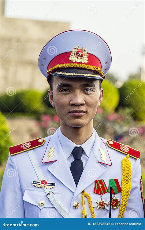 Male Member of the Vietnamese Army Wearing His Uniform and Posing for ...