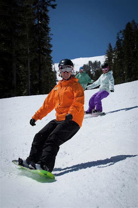 Snowboard Instructor Riding And Giving Photograph by Trevor Clark | Fine Art America