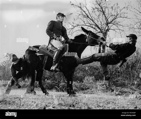 charlton heston, michael anderson jr, major dundee, 1965 Stock Photo ...