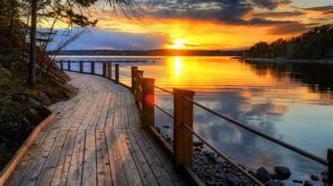 Boardwalk along the lake at sunset wallpaper - backiee