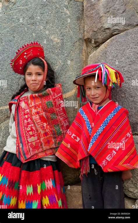 Peruvian children in traditional dress in Ollantaytambo, Urubamba Valley, Peru, South America ...