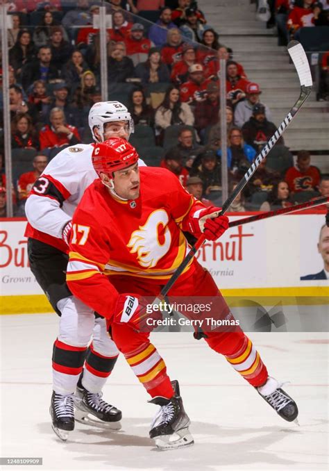 Milan Lucic of the Calgary Flames skates against Travis Hamonic of... News Photo - Getty Images