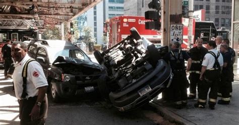 Vehicle Flips After Striking L Support Beam, 2 Seriously Hurt - CBS Chicago