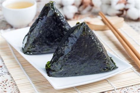 Korean triangle kimbap samgak with nori rice and tuna fish similar to ...