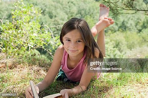 4,187 Girl Lying Barefoot Stock Photos, High-Res Pictures, and Images - Getty Images