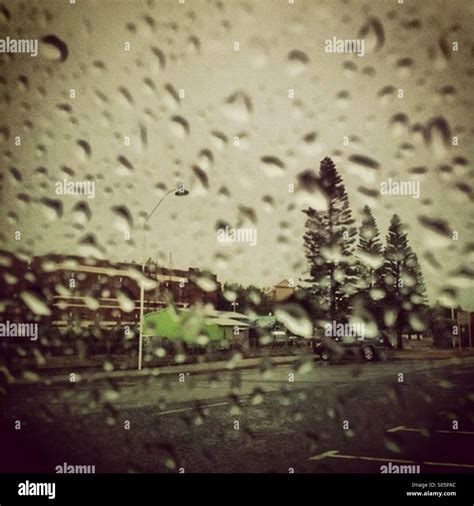 Rain on window view Stock Photo - Alamy