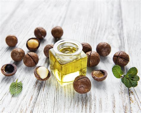 Natural macadamia oil and Macadamia nuts 3044572 Stock Photo at Vecteezy