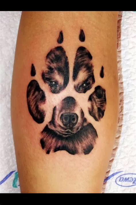 Dog in paw print tattoo | Tattoos | Pinterest