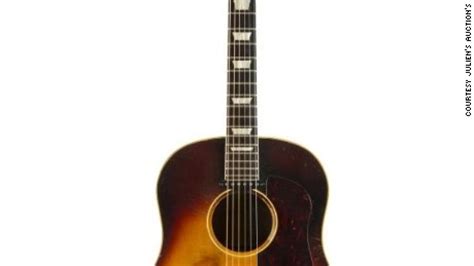 John Lennon's acoustic guitar sells for $2.4 million - CNN