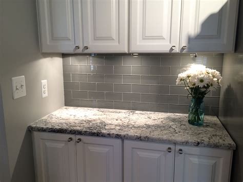 Granite: Delicatus White, paint: Sherwin Williams March Wind, grey subway tile backsplash with ...