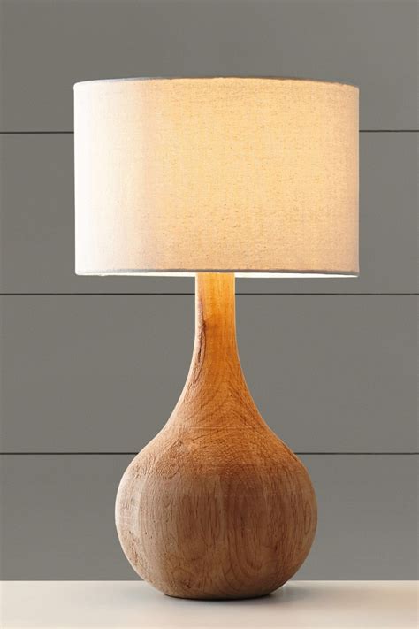 Pin by Alex Phillips on Beach Bar and Lounge | Table lamp, Wooden table lamps, Wooden lamp base