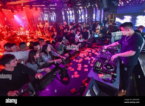 NANJING, CHINA - JANUARY 1, 2022 - Citizens celebrate the arrival of 2023 at a bar in Nanjing ...