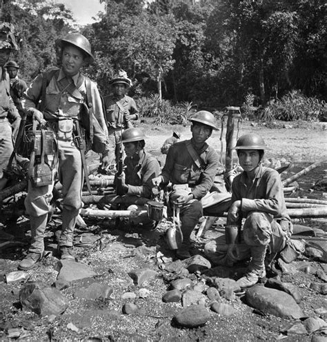 10 Apr 1942, Philippines --- Victorious Filipino scouts after cleaning ...