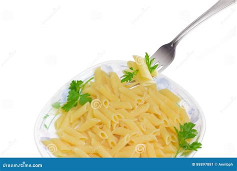 Fork with Cooked Cylinder-shaped Pasta Over Dish with Pasta Stock Image ...